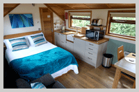 inside the luxury cedar lodge at Old Oaks
